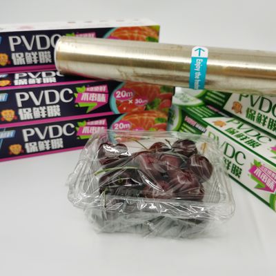 Rào cản cao PVDC Bọc màng bọc thực phẩm Dễ dàng gắn thực phẩm Cuộn màng bọc thực phẩm không chứa BPA
